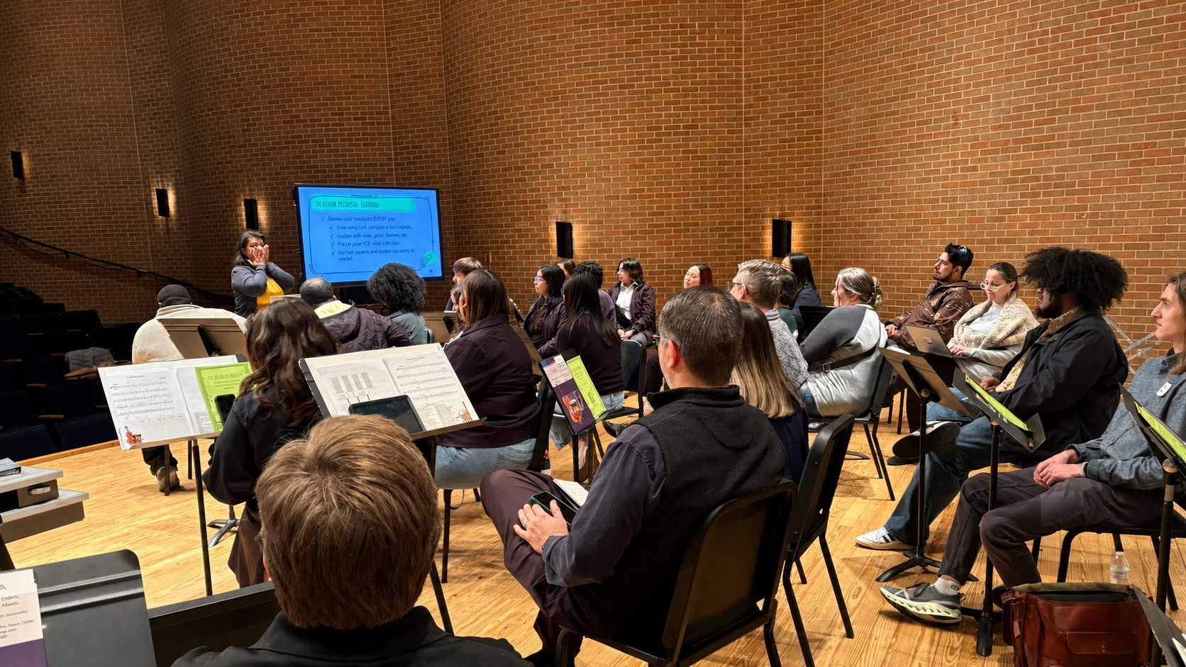 Music educators participating in a professional development workshop